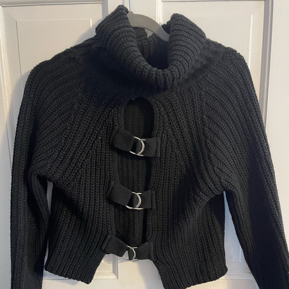 Cut out back on black turtle neck knit sweater